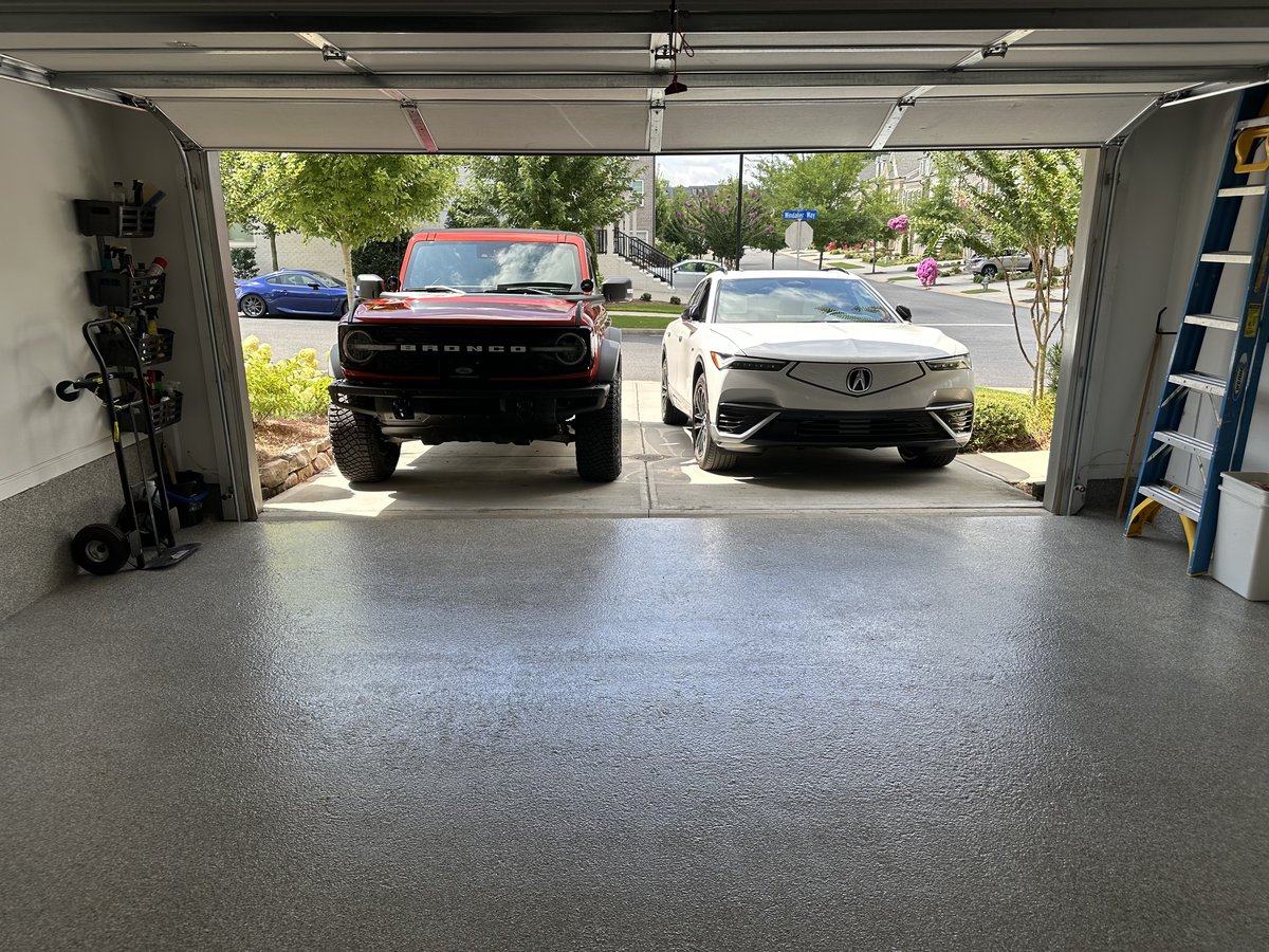 Two-car garage with coated floor - Bronco and Acura